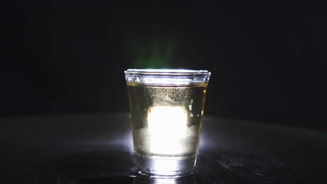 Silhouette-of-a-Shot-Glass-filled-with-Whiskey