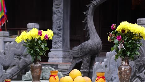 temple altar with flowers and fruits offering