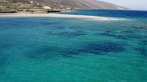 Aerial-Drone-Footage-Of-A-Very-Small-Beach-In-Greek-Paradise