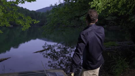 Businessman working in the forest.