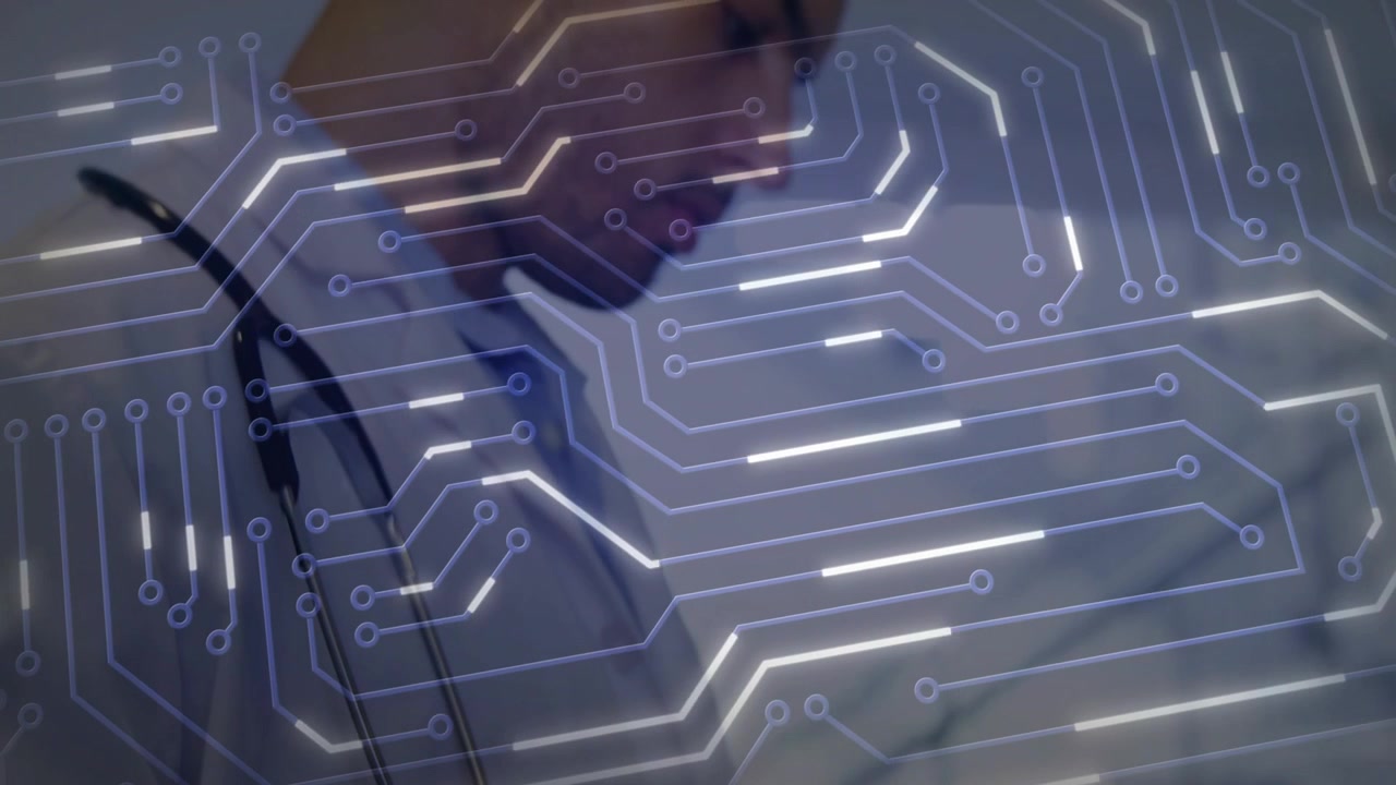 Male physician tapping handheld device while circuit overlay intensifying, revealing medical data