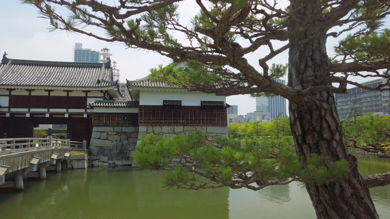 Hiroshima Castle with bridge and Hirayagura Turret in Japan. Was constructed in the 1590, but was destroyed by the atomic bombing on 1945 and was rebuilt in 1958.