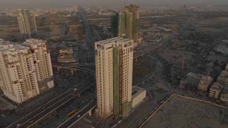 karachi sindh pakistan - : head office building efu insurance at tower in front of karachi port trust and other financial institutions