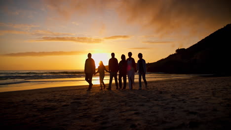 sunset, love and silhouette of family at the beach