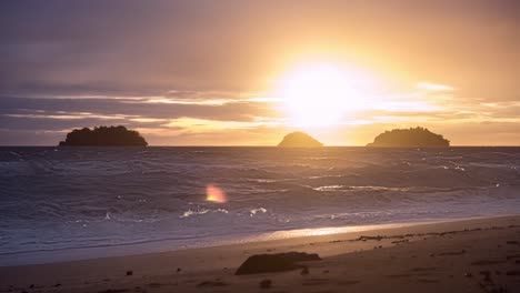 4k timelapse day to night of silhouette islands on the horizon with beautiful stunning sunset along the beach in koh chang, thailand