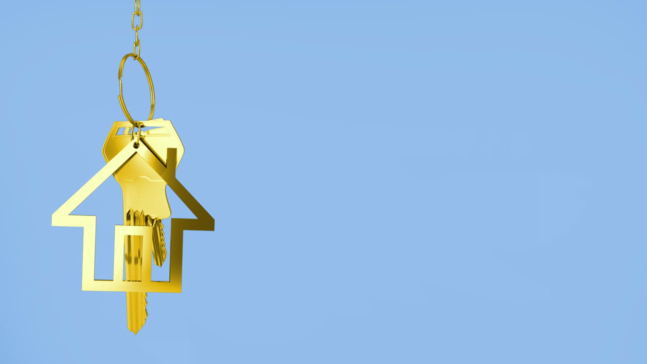 animación de las llaves de la casa dorada contra el espacio de copia en fondo azul