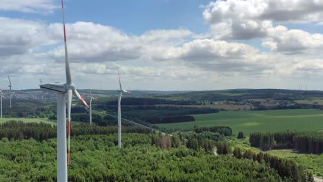 large wind farm near trier, germany with many wind turbines