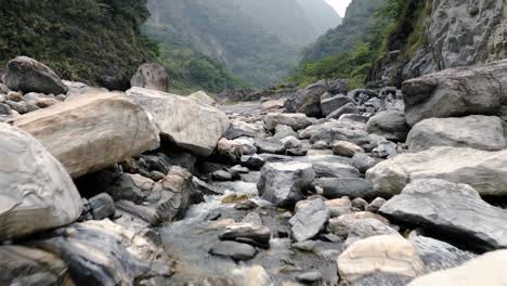 Huge-Rocks-Wild-Big-Stones-Remote-River-through-Mountain-Valley-in-Taroko-Gorge-Taiwan,-Planet-Clear-Water-Cycle-Source-from-the-Mountains