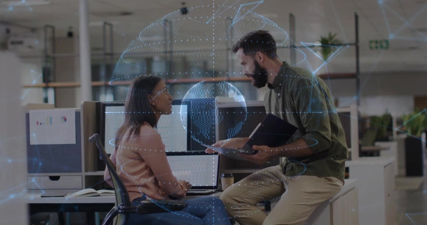Woman typing laptop data triggers colleague tapping tablet showing globe network updating tech data