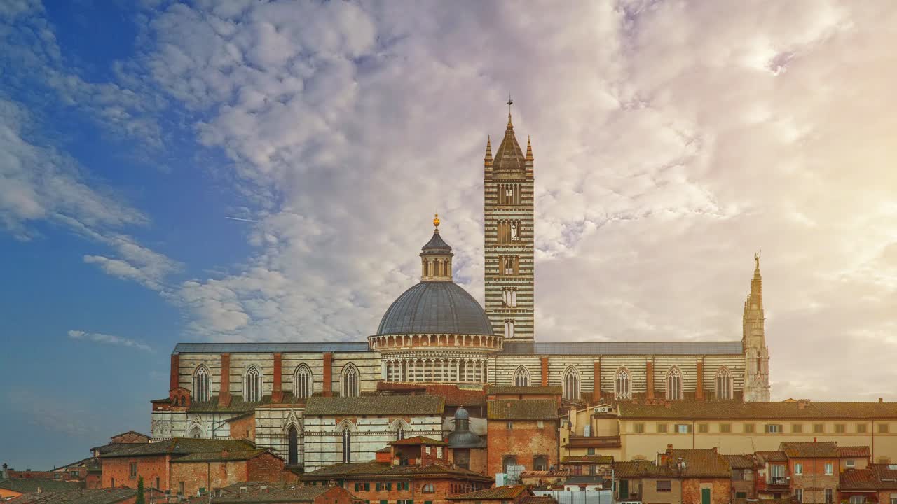 Medieval Skyline with the Duomo di Siena with it's Campanile - 4k time-lapse video, location: Siena, Tuscany, Italy