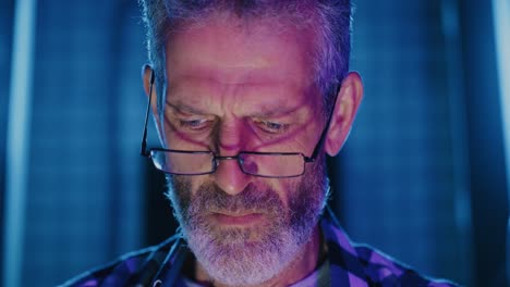 close-up of a focused senior man