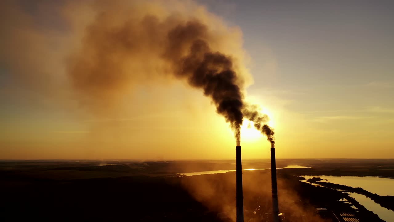 Industrial view with smokestack. Pollution by smoke coming out of factory