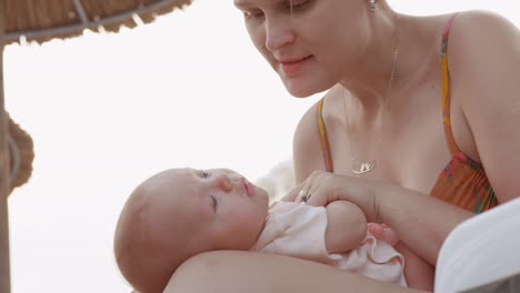 mother kissing beloved baby daughter