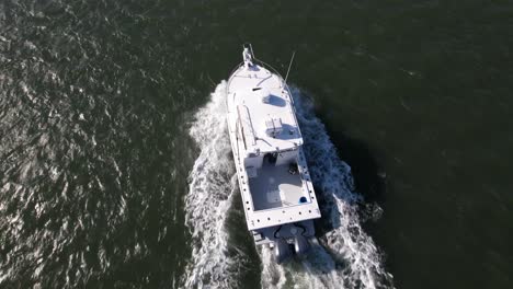 An-aerial-view-over-the-East-Rockaway-Inlet-in-Queens,-NY-on-a-sunny-day