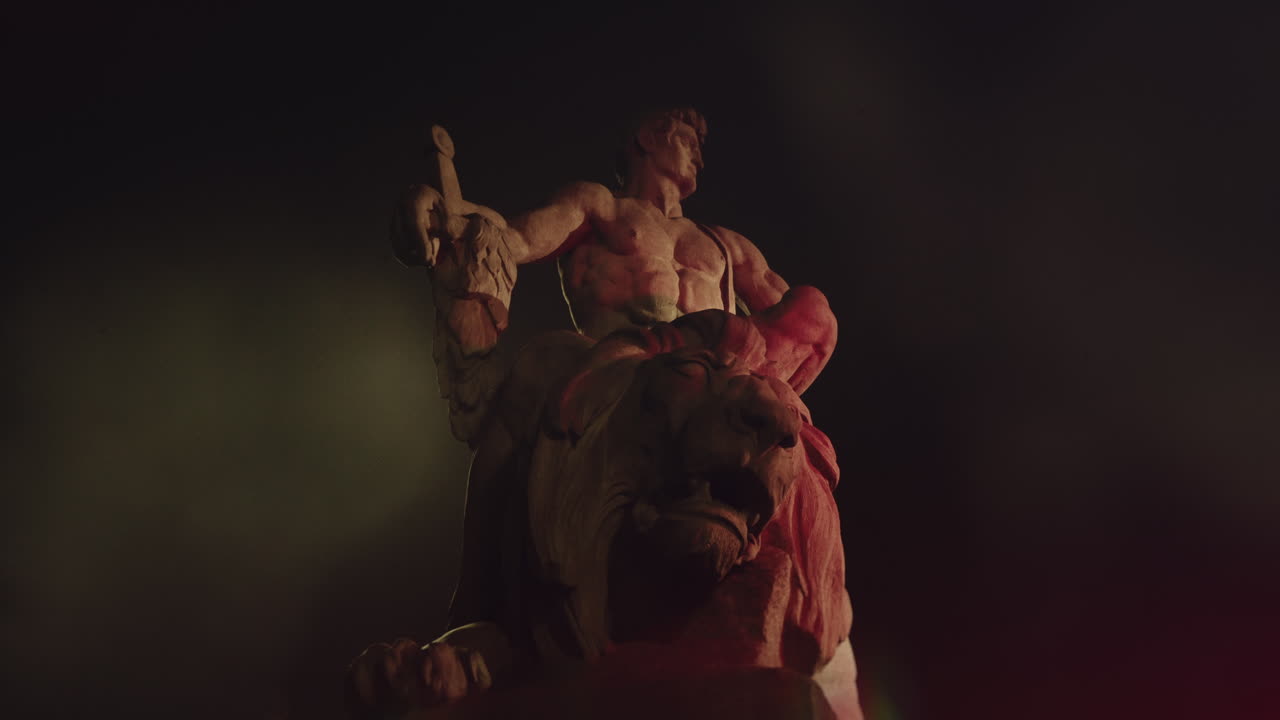 Epic, ancient stone statue at night