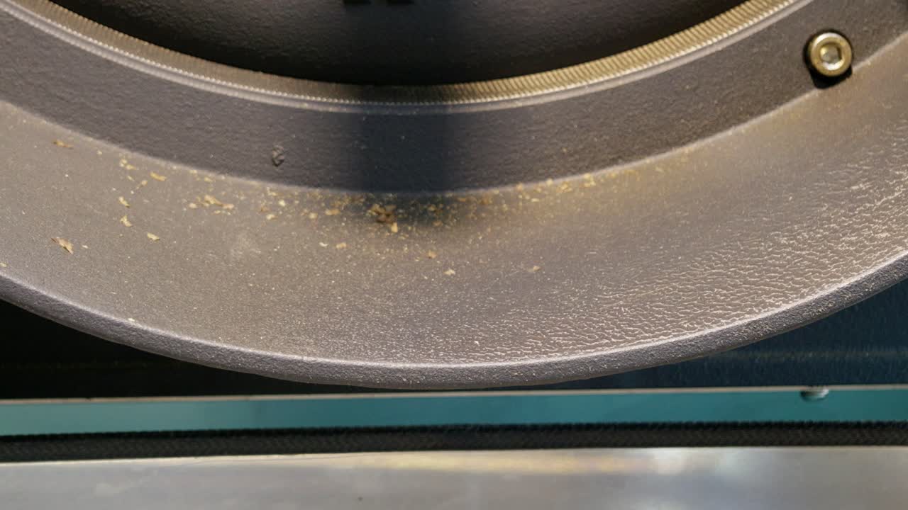 Roasting coffee beans coffee shop close-up industrial setting high angle freshness concept