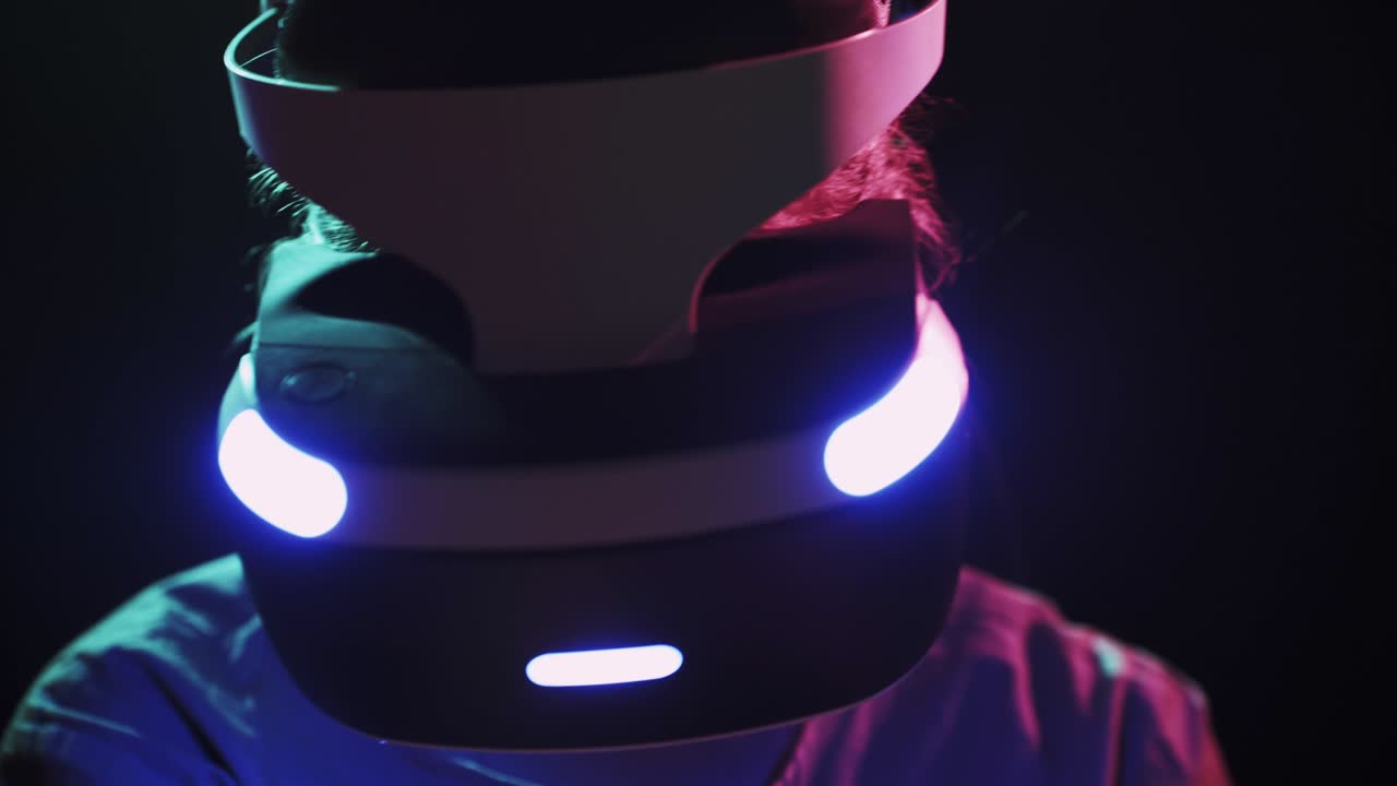 Detail woman in VR headset playing with virtual objects