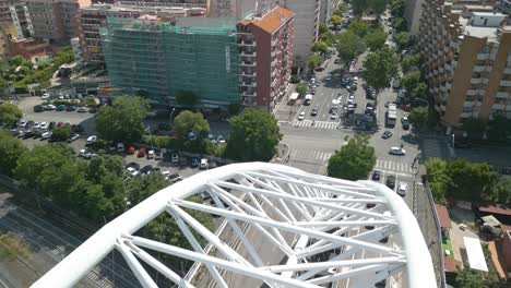 Backwards-Drone-Shot-Reveals-White-Bridge-in-Rome,-Italy