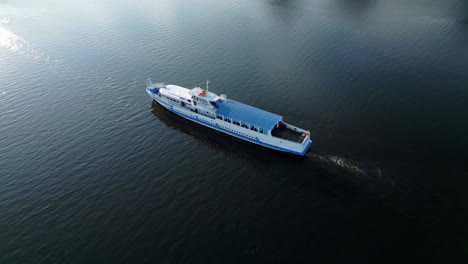 aerial view of a passenger boat cruising on water