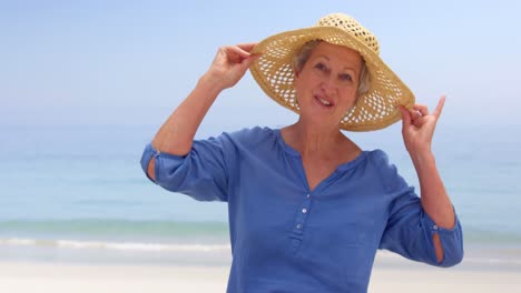 Retired-woman-putting-her-hat-on