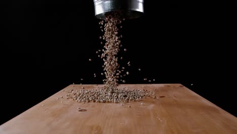 The-Dark-Coffee-Beans-Are-Poured-On-The-Table