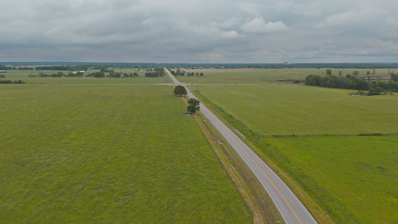 Road Between Farm Fields In Cherokee City, Arkansas, USA - Aerial Drone Shot