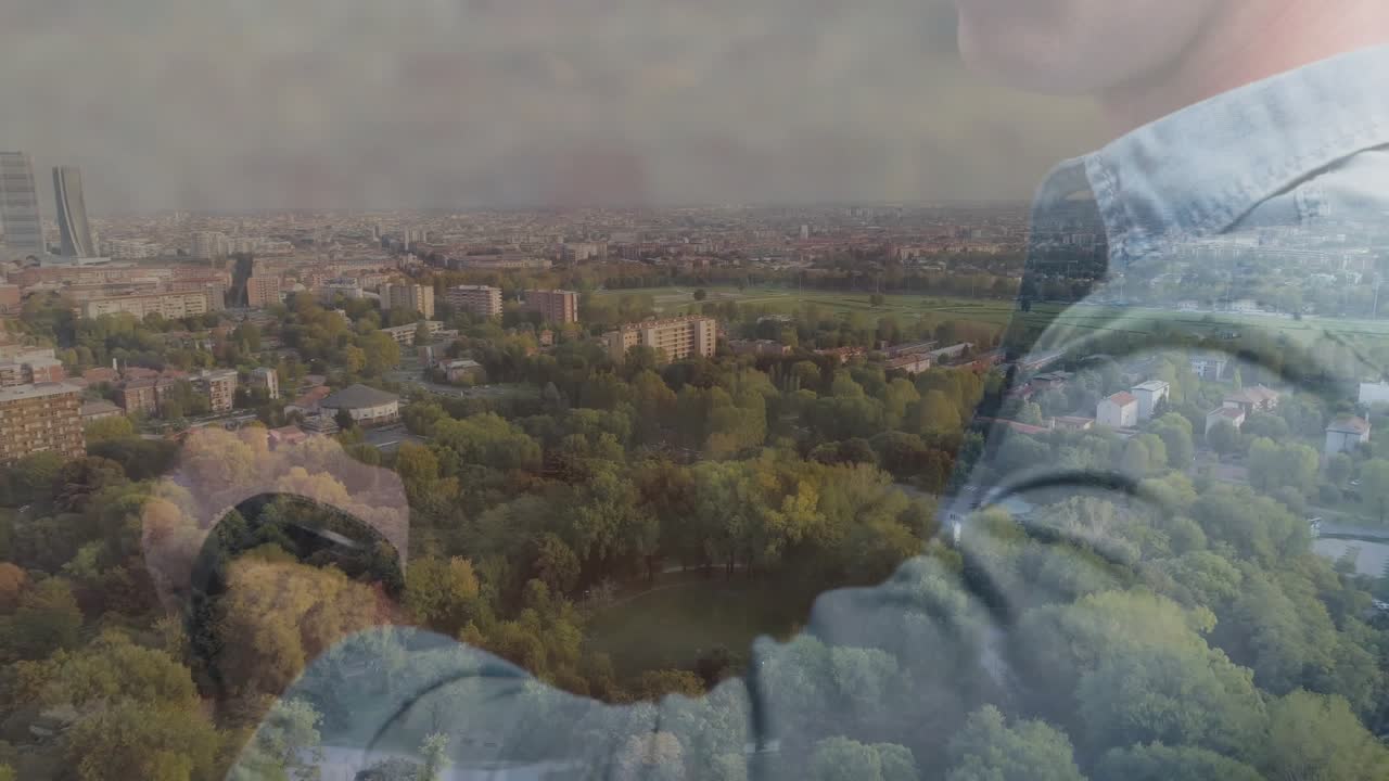 Lead analyst shifting arm and holding phone, updating finance charts over park monitoring markets