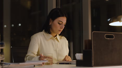 woman working late at the office