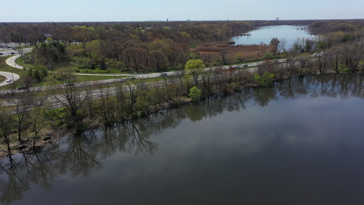 An aerial view of some reflective lakes during the day