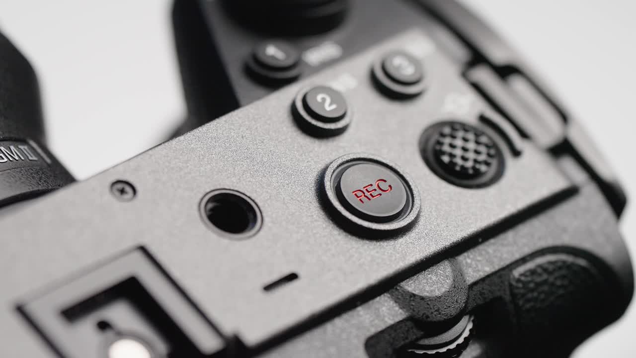 Close-up shot of the record button on the Sony FX3, highlighting the ergonomic design for quick access