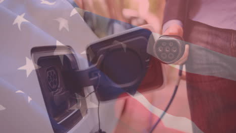 bandera de los estados unidos de américa sobre una mujer cargando un coche eléctrico