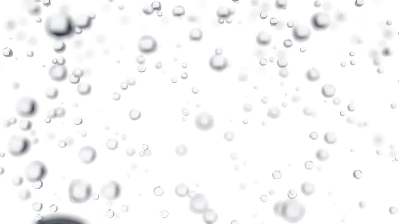 물방울이 가운 배경에 천천히 떨어지고 있습니다.