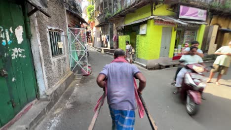 Rickshaw Ride Through a Busy Kolkata Street