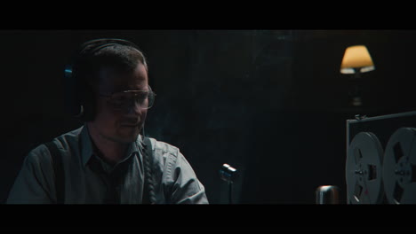 an intelligence officer listens to the wiretap recordings