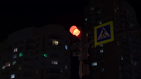 night traffic light at pedestrian crossing