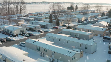 Winter-snow-falls-on-rural-mobile-home-park-in-poor-Appalachian-community