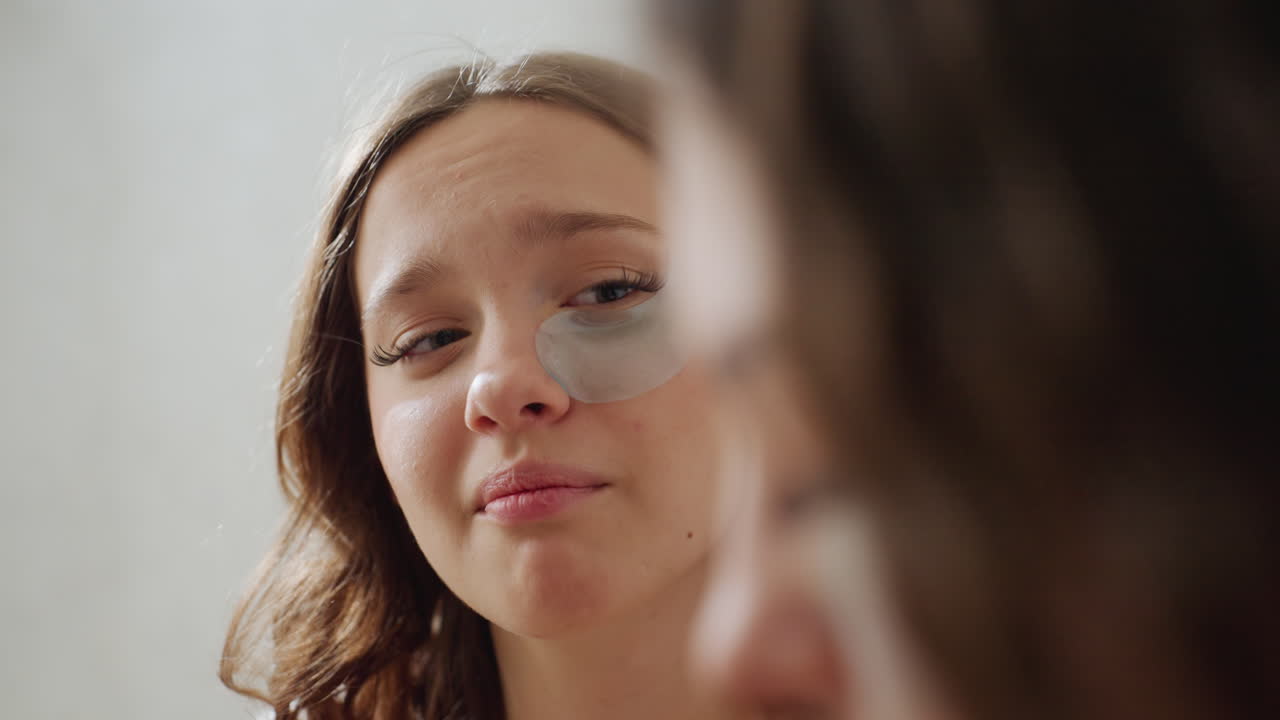 Woman Gets Eyelash Extensions Professionally, Makeup Artist Carefully Applies Eyelash Extensions To Woman, Detailed View Of Woman Receiving Precise Eyelash Extension Treatment In Studio Setting