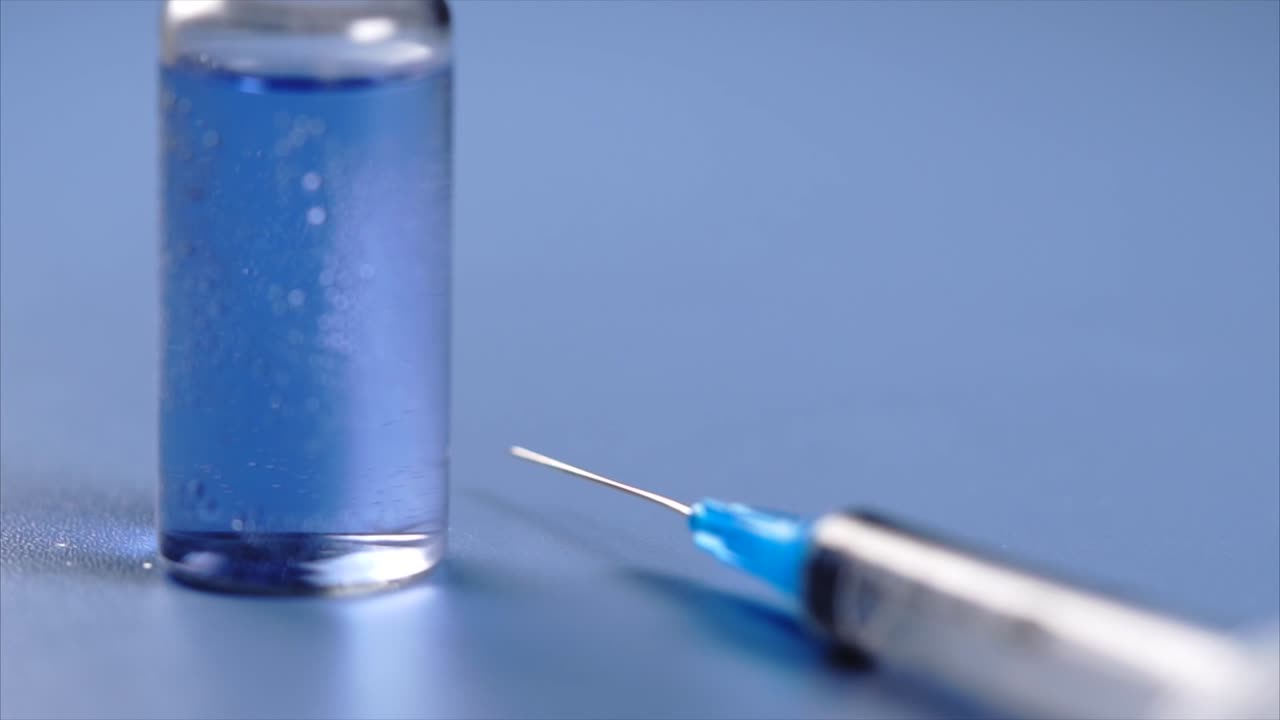 Vaccine Vial and Syringe