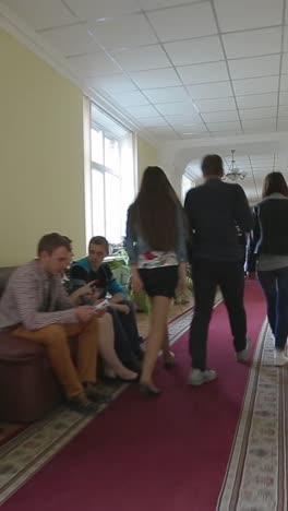 students take a break between classes