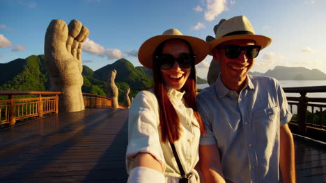 couple's golden hour stroll on vietnam's golden bridge