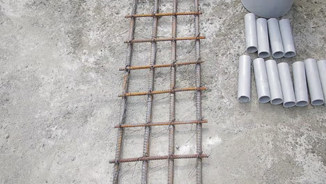 steel reinforcement mesh and pvc pipes on the construction site ready for use