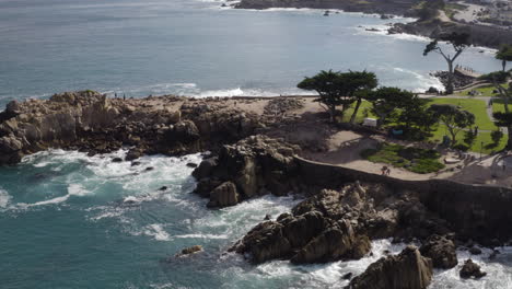 4k cinematic high angle tracking shot of lovers point in pacific grove california on a sunny day