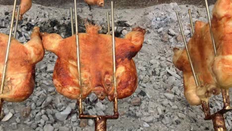 thai street food : charcoal grilling chickens