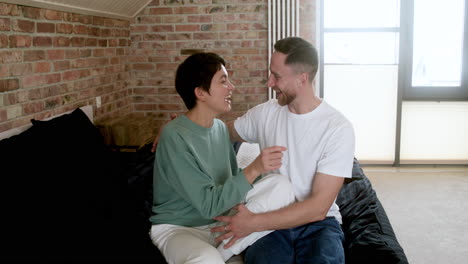 Couple-talking-on-the-bed