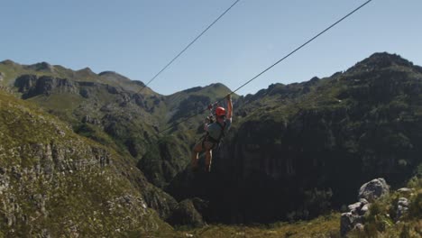 young caucasian man zip lining