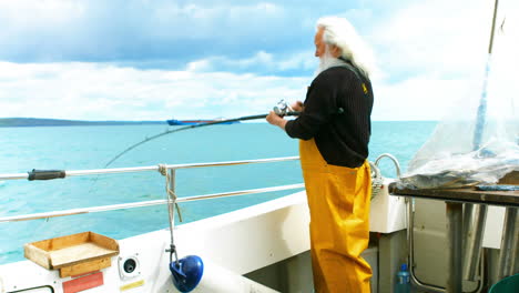 fisherman fishing from the boat