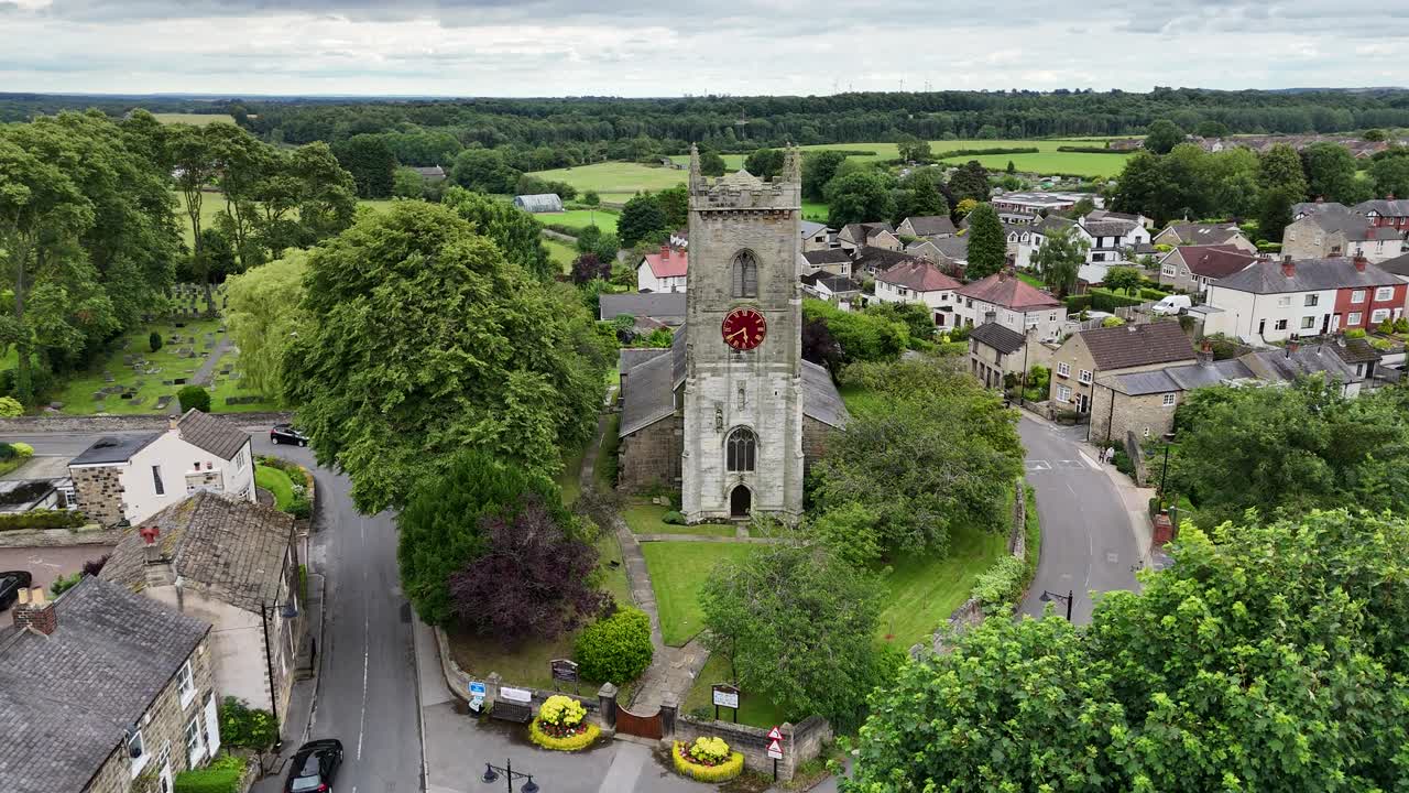 Aerial View of a Stone Church in a Quaint English Village
