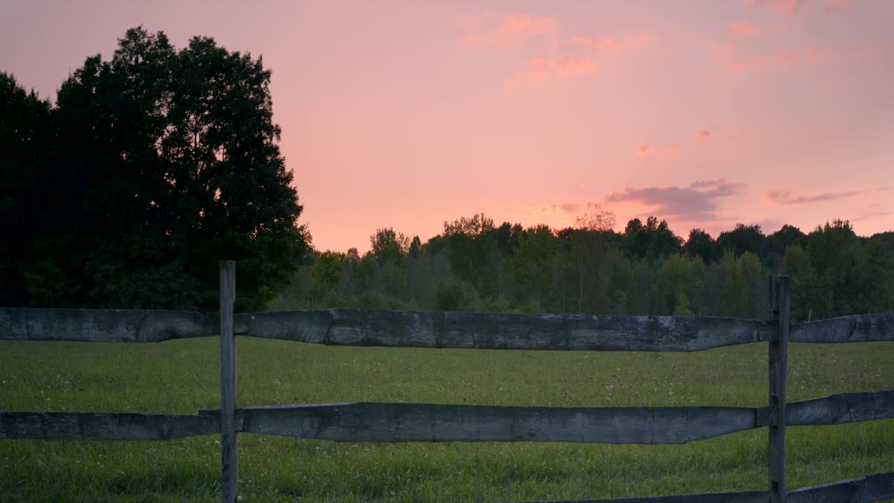 Fence of a farm at sunset near the Joseph Smith family farm, frame house, temple, visitors center, and the sacred grove in Palmyra New York Origin locations for the Mormons and the book of Mormon
