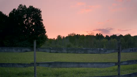 fence of a farm at sunset near the joseph smith family farm, frame house, temple, visitors center, and the sacred grove in palmyra new york origin locations for the mormons and the book of mormon