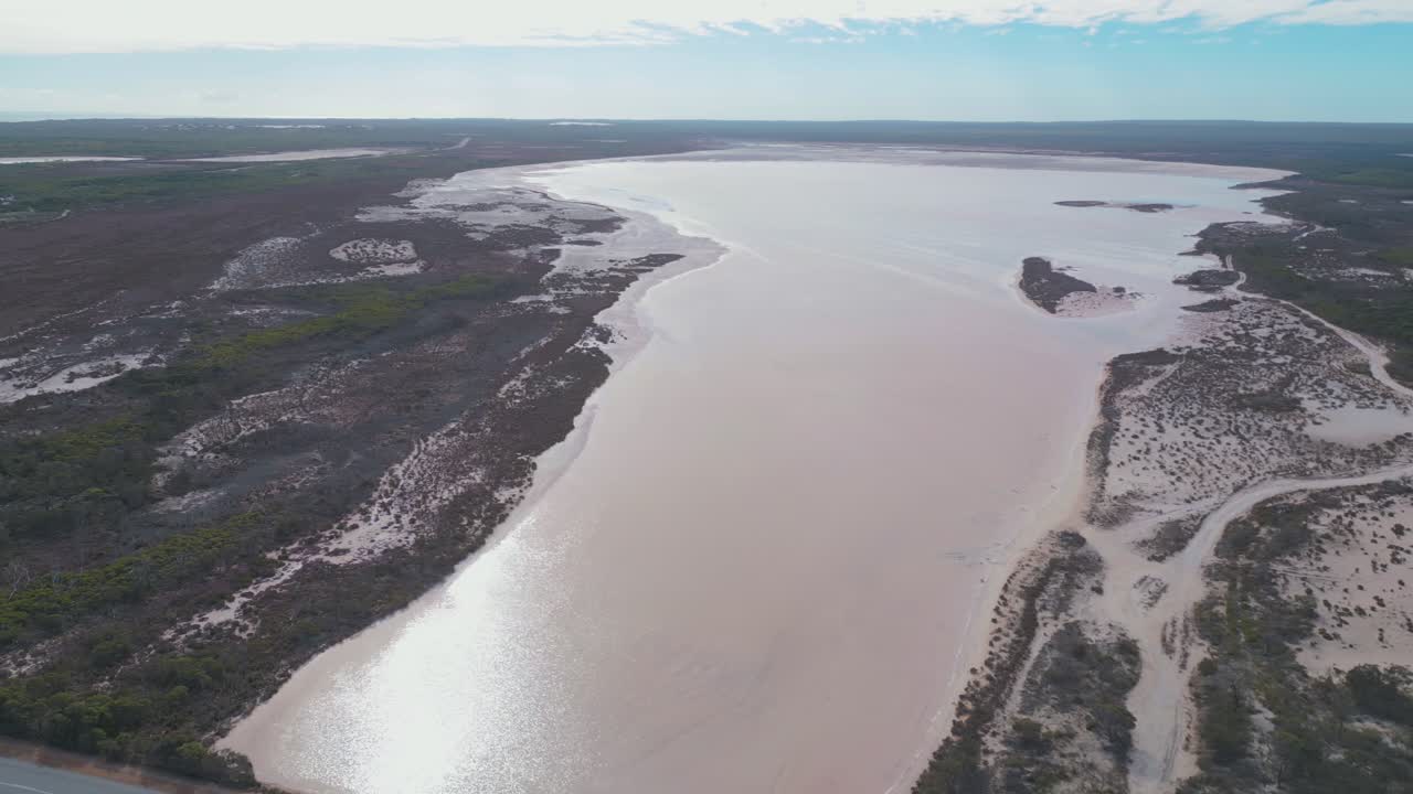 Panning drone footage of the Leeman Salt Lake in Perth, Western Australia